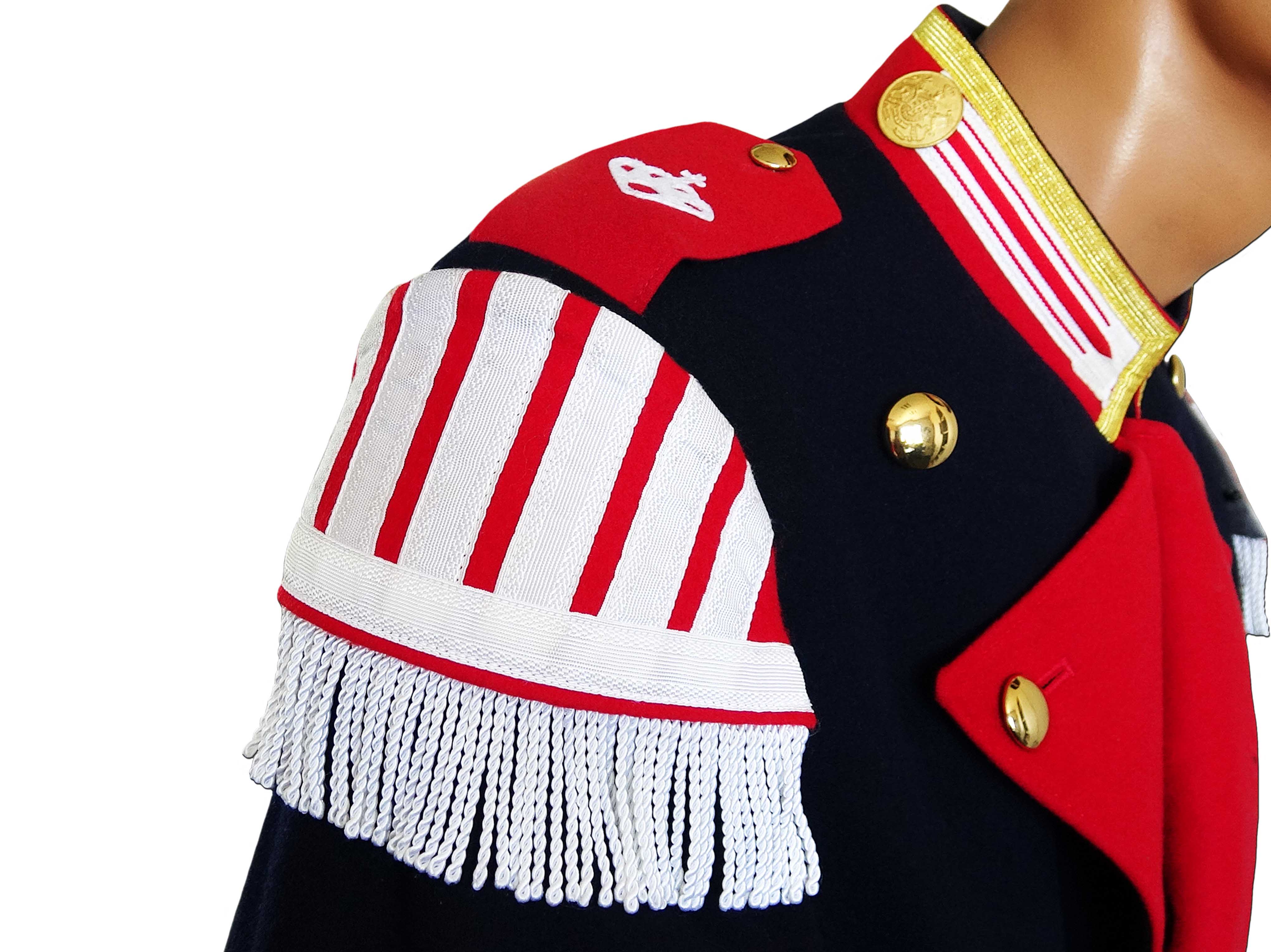 Braids and corded fringes in white on red felt Braids and corded fringes in white on red felt